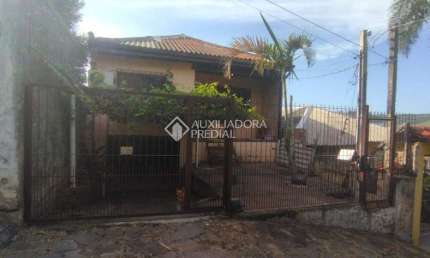 Casa com 2 quartos à venda na Rua Martim Minaberry, 241, Partenon, Porto Alegre, 202 m2 por R$ 450.000
