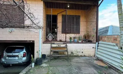 Casa com 2 quartos à venda na Rua Martim Minaberry, 241, Partenon, Porto Alegre, 202 m2 por R$ 450.000