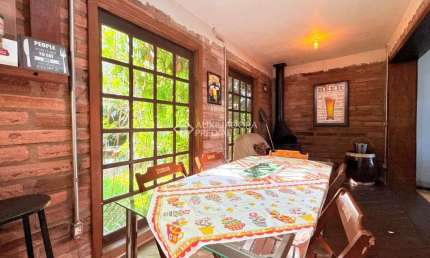 Casa com 4 quartos à venda na Rua Jóia, 220, Vila Nova, Porto Alegre, 200 m2 por R$ 520.000