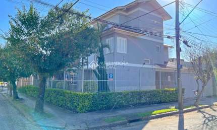 Casa com 3 quartos à venda na Rua Luiz Delfino, 99, Espírito Santo, Porto Alegre, 182 m2 por R$ 749.000