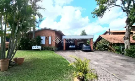 Casa em condomínio fechado com 5 quartos à venda na Avenida Firmino Octávio Bimbi, 255, Cavalhada, Porto Alegre, 274 m2 por R$ 1.390.000