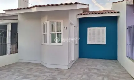 Casa em condomínio fechado com 2 quartos à venda na Rua Capitão Pedroso, 769, Restinga, Porto Alegre, 109 m2 por R$ 250.000