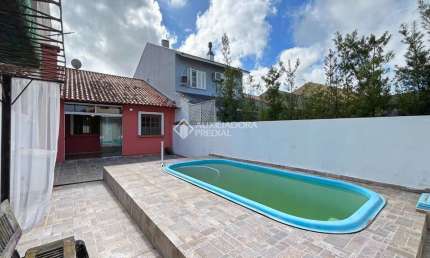 Casa com 2 quartos à venda na Rua Edgar Sanches Laurent, 76, Hípica, Porto Alegre, 66 m2 por R$ 399.000