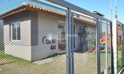 Casa em condomínio fechado com 2 quartos à venda na Rua Santa Mônica, 404, Ponta Grossa, Porto Alegre, 60 m2 por R$ 212.000
