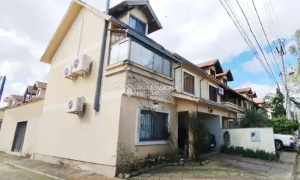 Casa em condomínio fechado com 3 quartos à venda na avenida da serraria, 2222, espírito santo, porto alegre, 110 m2 por r$ 650.000