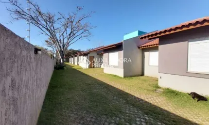 Casa em condomínio fechado com 2 quartos à venda na Rua Santa Mônica, 404, Ponta Grossa, Porto Alegre, 60 m2 por R$ 212.000