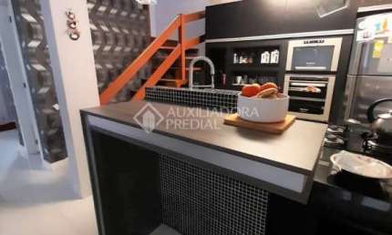 Casa em condomínio fechado com 3 quartos à venda na Rua Roberto Santini, 44, Hípica, Porto Alegre, 129 m2 por R$ 693.990