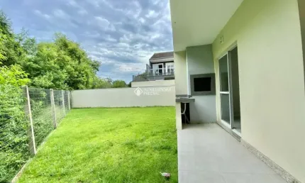 Casa em condomínio fechado com 3 quartos à venda na Rua Canísio Binsfeld, 226, Hípica, Porto Alegre, 123 m2 por R$ 595.000