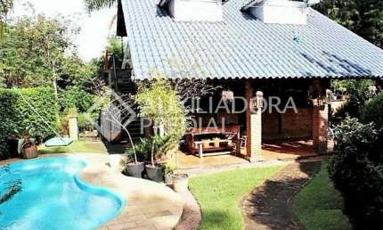 Casa em condomínio fechado com 5 quartos à venda na Rua Pedro de Oliveira França, 572, Hípica, Porto Alegre, 270 m2 por R$ 1.200.000