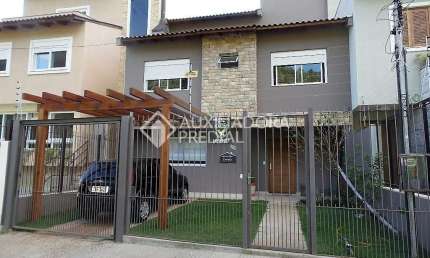 Casa em condomínio fechado com 3 quartos à venda na Rua Henrique Anawate, 590, Guarujá, Porto Alegre, 240 m2 por R$ 850.000