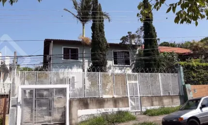 Casa em condomínio fechado com 3 quartos à venda na Rua dos Caiaguais, 207, Espírito Santo, Porto Alegre, 220 m2 por R$ 550.000