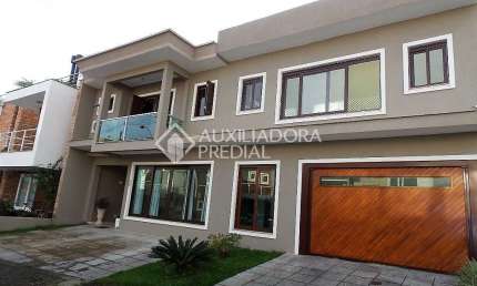 Casa em condomínio fechado com 3 quartos à venda na Rua Carlos Maximiliano Fayet, 80, Hípica, Porto Alegre, 305 m2 por R$ 1.100.000