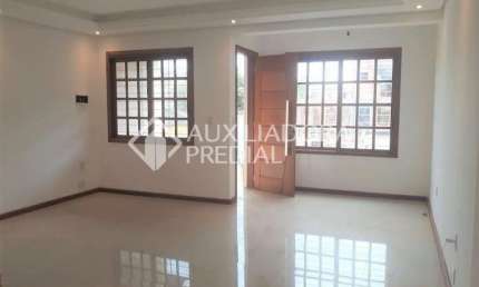 Casa em condomínio fechado com 3 quartos à venda na Rua Itacyr Rossi, 10, Cavalhada, Porto Alegre, 120 m2 por R$ 490.000