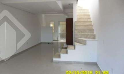 Casa em condomínio fechado com 3 quartos à venda na Avenida Vereador Roberto Landell de Moura, 328, Campo Novo, Porto Alegre, 101 m2 por R$ 345.000