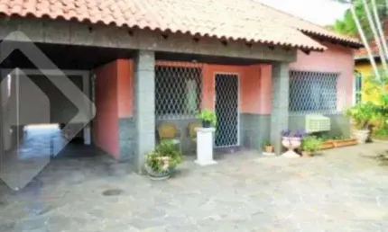 Casa em condomínio fechado com 5 quartos à venda na Rua Criciúma, 73, Guarujá, Porto Alegre, 220 m2 por R$ 453.000