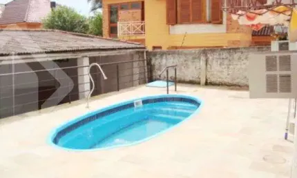 Casa em condomínio fechado com 3 quartos à venda na Rua Doutor Pereira Neto, 1364, Tristeza, Porto Alegre, 150 m2 por R$ 495.000