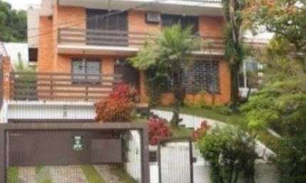 Casa em condomínio fechado com 3 quartos à venda na Avenida Fábio Araújo Santos, 1650, Nonoai, Porto Alegre, 279 m2 por R$ 957.500
