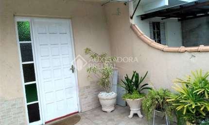 Casa em condomínio fechado com 3 quartos à venda na Rua Elvira Dendena, 385, Hípica, Porto Alegre, 120 m2 por R$ 375.000