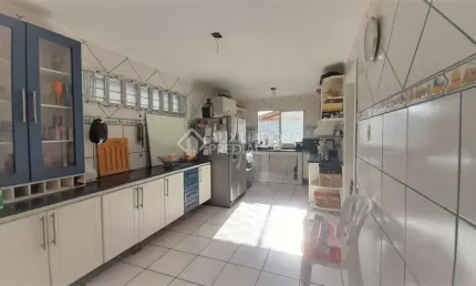 Casa em condomínio fechado com 4 quartos à venda na Avenida Joracy Camargo, 74, Santa Tereza, Porto Alegre, 229 m2 por R$ 450.000