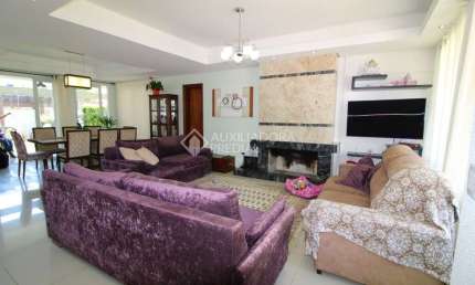 Casa em condomínio fechado com 5 quartos à venda na Rua Ivo Walter Kern, 599, Hípica, Porto Alegre, 332 m2 por R$ 2.064.000