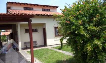 Casa em condomínio fechado com 4 quartos à venda na Travessa Alfredo Magalhães, 81, Cavalhada, Porto Alegre, 240 m2 por R$ 930.000