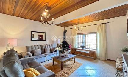 Casa em condomínio fechado com 5 quartos à venda na Rua Mata Coelho, 98, Nonoai, Porto Alegre, 200 m2 por R$ 600.000