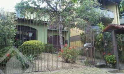 Casa em condomínio fechado com 4 quartos à venda na Rua Comandai, 560, Cristal, Porto Alegre, 300 m2 por R$ 850.000