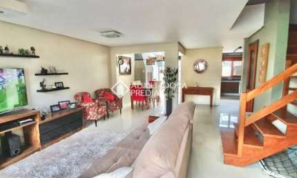 Casa em condomínio fechado com 3 quartos à venda na Rua Roberto Santini, 94, Hípica, Porto Alegre, 140 m2 por R$ 615.000