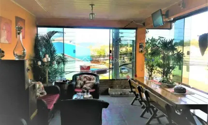 Casa comercial à venda na Rua Elvira Dendena, 334, Hípica, Porto Alegre, 357 m2 por R$ 692.000