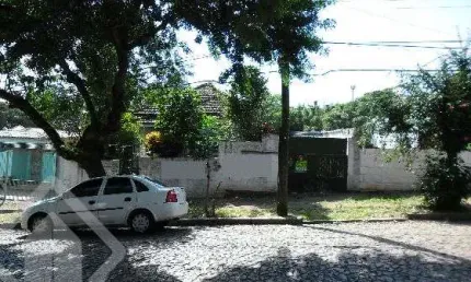 Terreno em condomínio fechado à venda na Rua Erechim, 792, Nonoai, Porto Alegre, 490 m2 por R$ 390.000