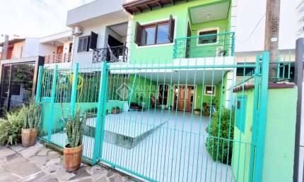 Casa em condomínio fechado com 3 quartos à venda na Rua Pau Brasil, 549, Hípica, Porto Alegre, 134 m2 por R$ 500.000