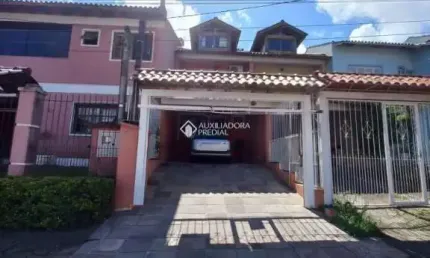 Casa com 3 quartos à venda na Rua James Bocacio, 116, Hípica, Porto Alegre, 123 m2 por R$ 450.000