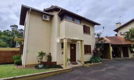 Casa em condomínio fechado com 3 quartos à venda na Rua Antônio José Cavasotto, 95, Ideal, Novo Hamburgo, 140 m2 por R$ 650.000