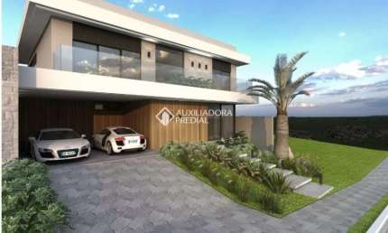 Casa com 4 quartos à venda na Rua das Petúnias, 10, Encosta do Sol, Estância Velha, 300 m2 por R$ 2.548.000