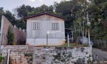 Casa com 3 quartos à venda na Rua Helmuth Larssen, 75, Rondônia, Novo Hamburgo, 43 m2 por R$ 165.000