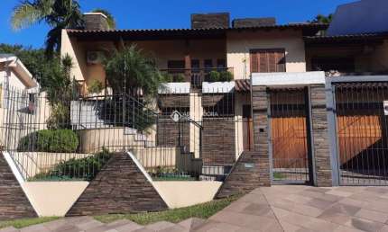 Casa com 3 quartos à venda na Rua Gustavo Leopoldo Feltes, 825, Canudos, Novo Hamburgo, 283 m2 por R$ 989.000