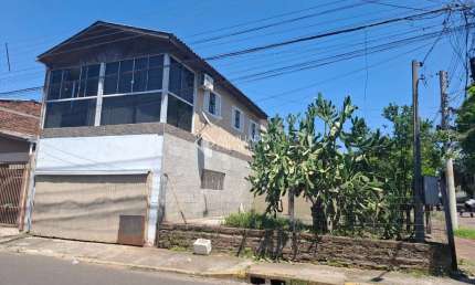 Casa com 3 quartos à venda na Rua Campo Bom, 2337, Canudos, Novo Hamburgo, 292 m2 por R$ 400.000