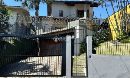 Casa com 3 quartos à venda na Rua Gramado, 359, Ouro Branco, Novo Hamburgo, 237 m2 por R$ 950.000