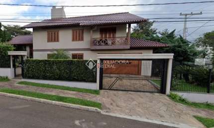 Casa com 3 quartos à venda na Rua Turquia, 220, Petrópolis, Novo Hamburgo, 180 m2 por R$ 960.000