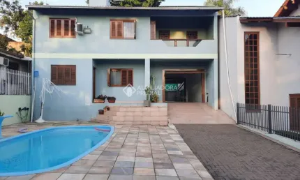 Casa com 4 quartos à venda na Rua Canela, 110, Ouro Branco, Novo Hamburgo, 242 m2 por R$ 750.000
