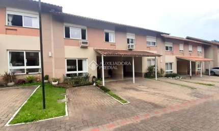 Casa em condomínio fechado com 3 quartos à venda na Rua Guia Lopes, 968, Rondônia, Novo Hamburgo, 121 m2 por R$ 590.000