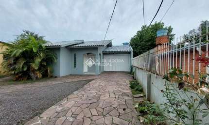 Casa com 3 quartos à venda na Rua Odon Cavalcante, 915, Canudos, Novo Hamburgo, 178 m2 por R$ 450.000