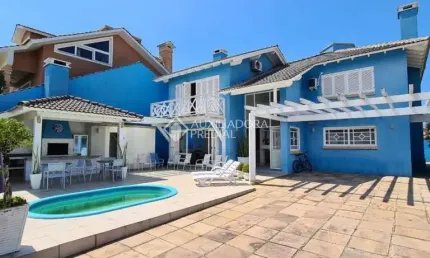 Casa em condomínio fechado com 4 quartos à venda na Avenida Paraguassu, 724, Centro, Xangri-Lá, 244 m2 por R$ 2.349.900