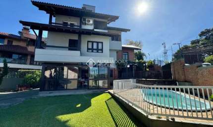 Casa com 4 quartos à venda na Guaporé, 79, Primavera, Novo Hamburgo, 304 m2 por R$ 1.099.000