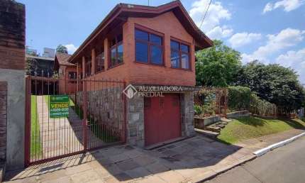 Casa com 3 quartos à venda na Rua Epitácio Pessoa, 745, Primavera, Novo Hamburgo, 326 m2 por R$ 1.290.000