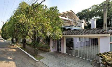 Casa com 4 quartos à venda na Rua Gustavo Leopoldo Feltes, 275, Canudos, Novo Hamburgo, 276 m2 por R$ 450.000