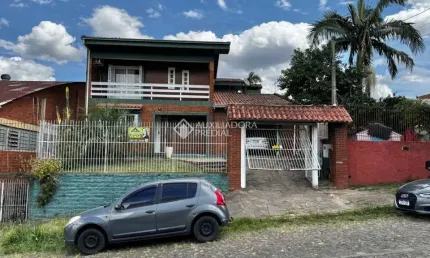 Casa com 3 quartos à venda na Ucrânia, 172, Canudos, Novo Hamburgo, 232 m2 por R$ 520.000