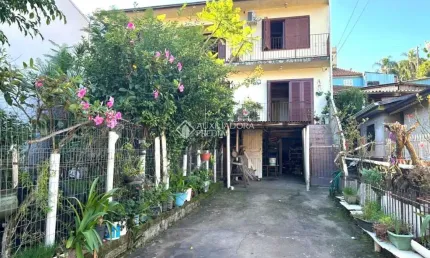 Casa com 3 quartos à venda na Rua Paquistão, 223, Rincão, Novo Hamburgo, 2970 m2 por R$ 350.000