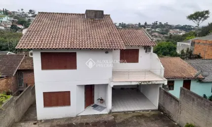 Casa com 3 quartos à venda na Rua Alto Uruguai, 157, Rincão, Novo Hamburgo, 250 m2 por R$ 450.000