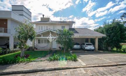 Casa em condomínio fechado com 3 quartos à venda na Estrada Martin Luther, 700, Lomba Grande, Novo Hamburgo, 300 m2 por R$ 980.000